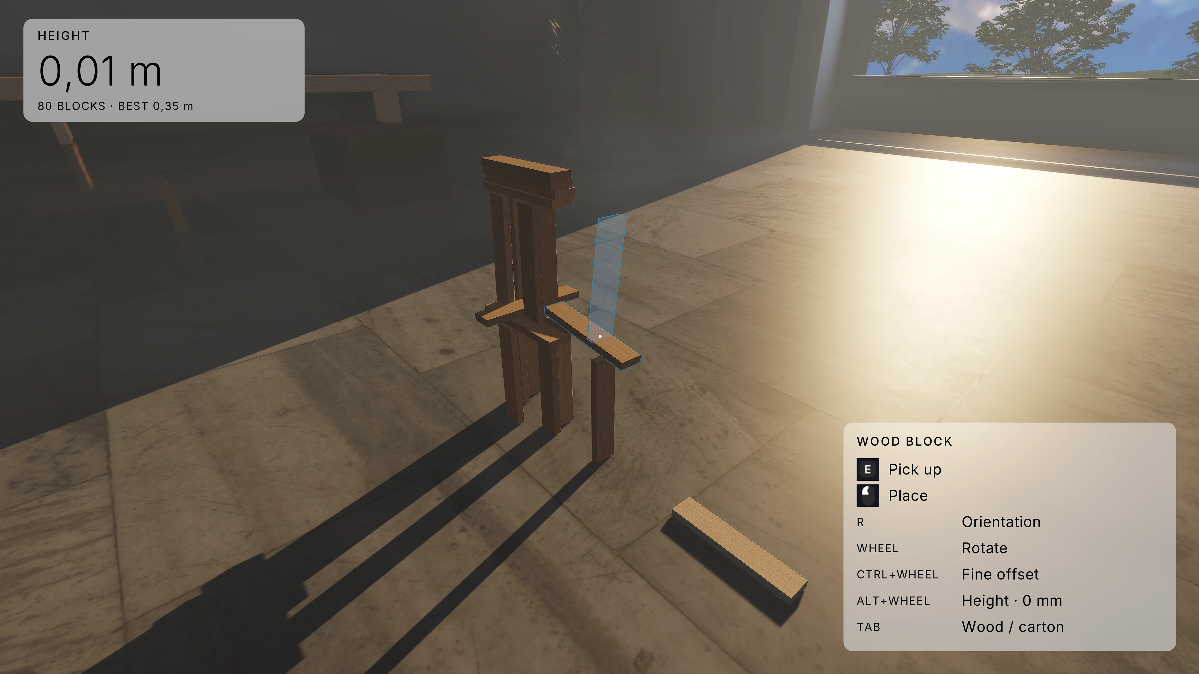 A player-built wooden tower on the reflective stone floor in the sunlit mountain atelier, with gameplay interface visible.