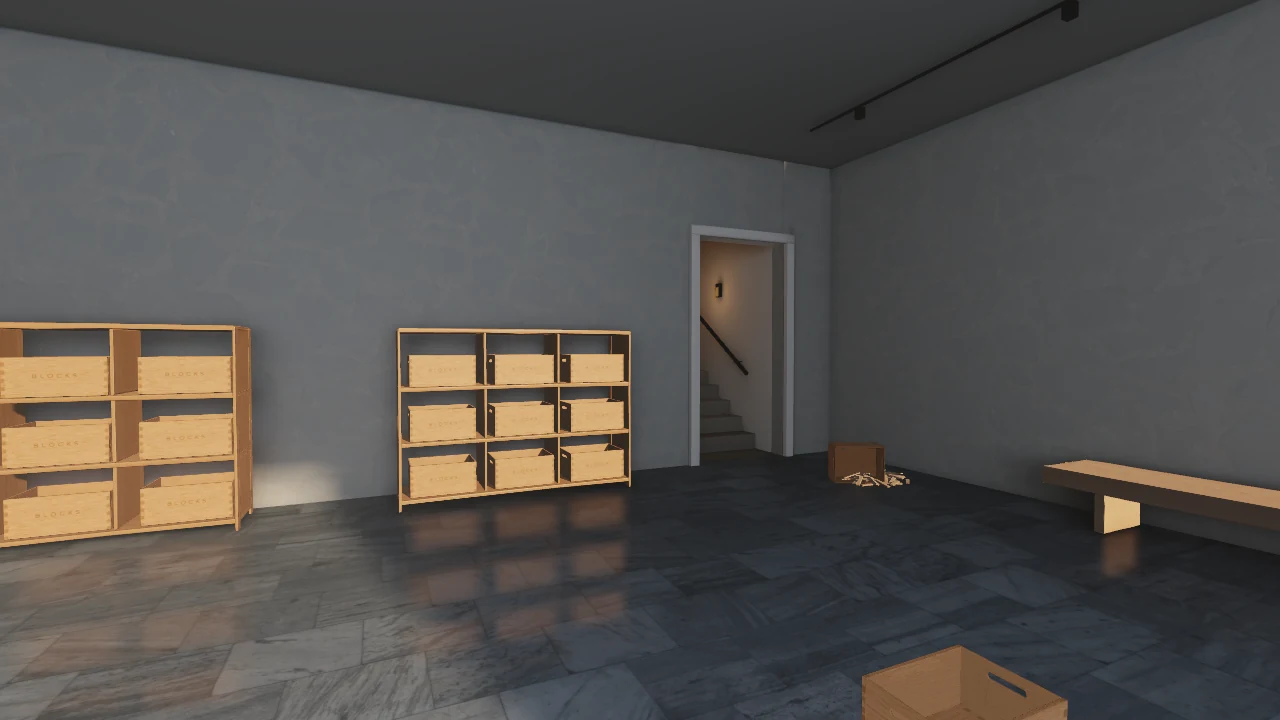 Rear corner of the atelier with shelves, decorative spilled blocks and a shallow warm-lit background stairwell.