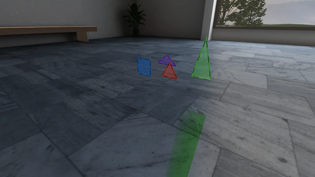 Transparent magnetic shapes with green filtered sunlight on the floor.