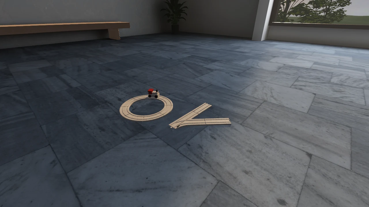 Eight 45-degree wooden curves form a circle beside a grooved switch and small wooden locomotive.